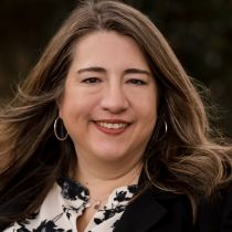 Headshot of Amber Olsen, owner of NEXTAFF of Gulf Coast